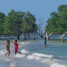 Happy girls on the beach of Mji Mwema